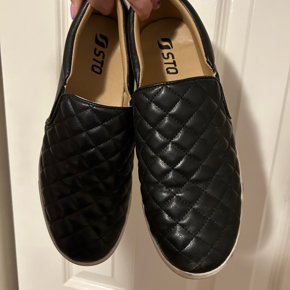 Black slip on sneakers